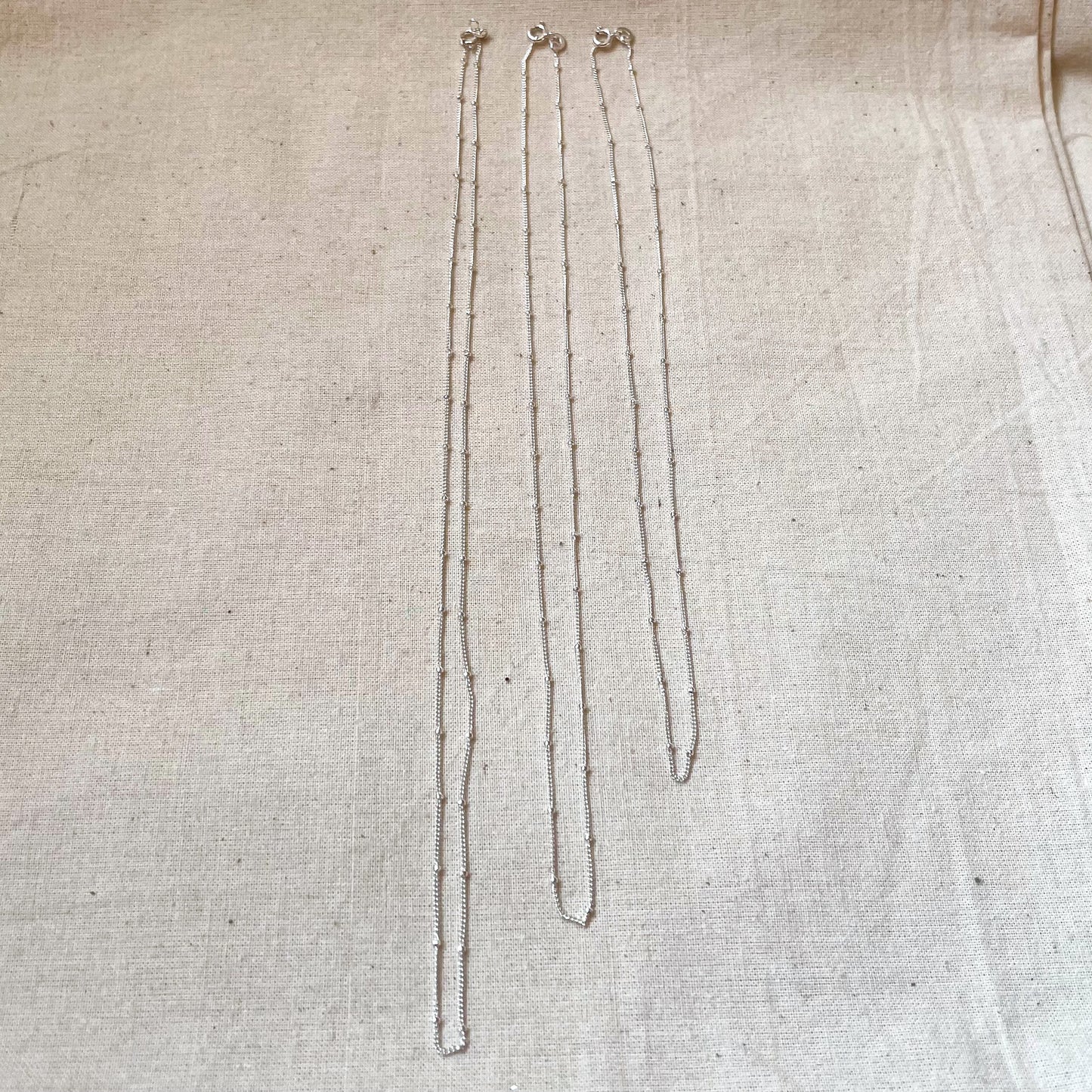 Silver satellite chains