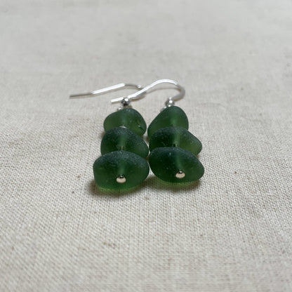 green sea glass earrings, made up of three small pieces of sea glass