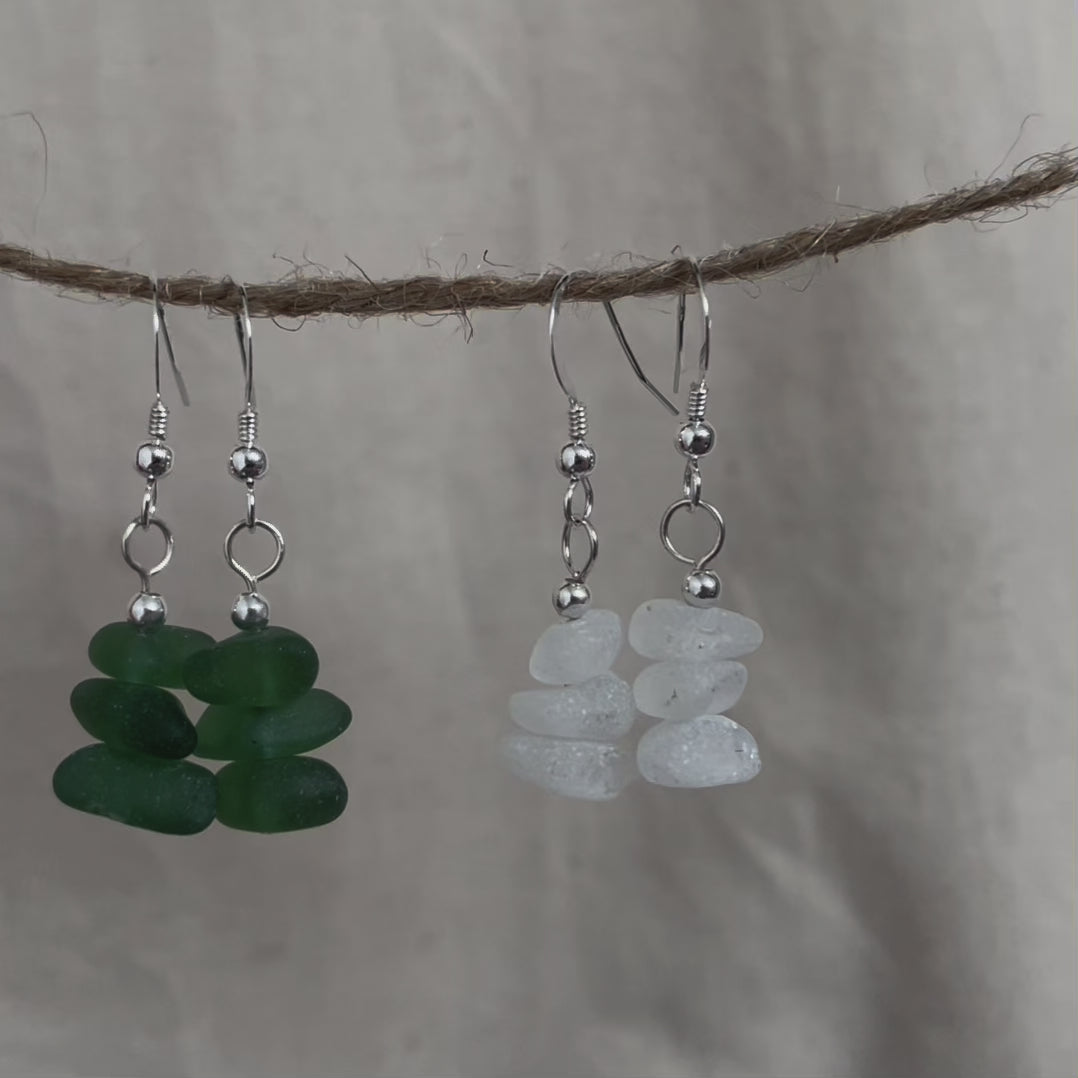 Sea glass earrings, green sea glass earrings (left), white sea glass earrings (right)